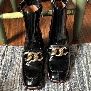 Elegant Black Ankle Boots with Gold Chain